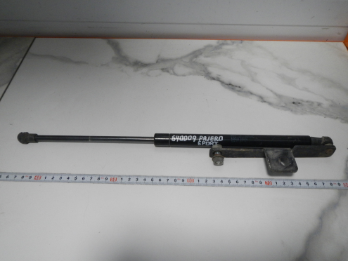 Фотография Амортизатор капота, Mitsubishi (Митсубиси)-PAJERO SPORT (KS) (15-)